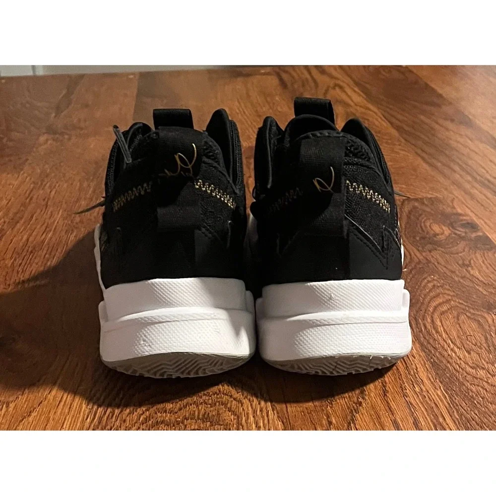 Jordan Why Not Zer0.3 GS Black Metallic Gold White Mens 7Y Basketball